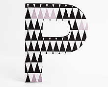 wood letter P with black triangles texture