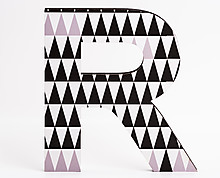 wood letter R with black triangles texture